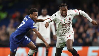 Milan's Rafael Leao on the attack against Raheem Sterling of Chelsea. EPA