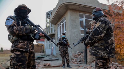 Taliban soldiers inspect the scene of an operation against militants at an ISIS hideout in Kabul. EPA