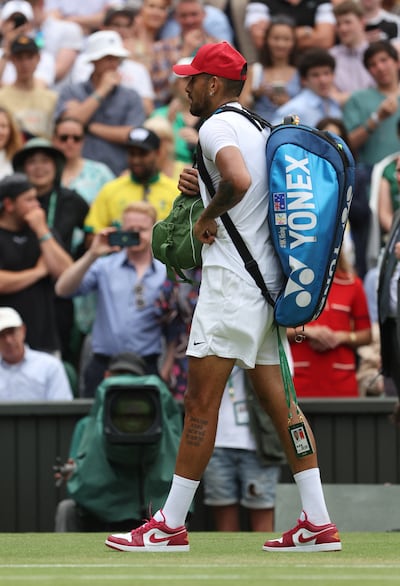 Nick Kyrgios changed into red-and-white Air Jordan trainers and a red cap to leave the court. Reuters