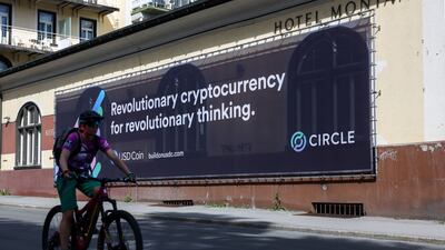 A cryptocurrency banner in Davos, Switzerland. A World Economic Forum report shows the increasing acceptance of digital currencies poses challenges for capital markets, investors, regulators and tax authorities globally. Bloomberg