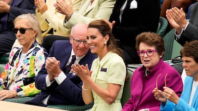 The Princess of Wales, centre, sits in the royal box with tennis legends Billie Jean King, second right, Martina Navratilova and AELTC chairman Ian Hewitt. AP