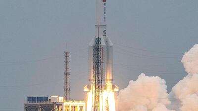 A Long March 5B rocket carries China's 'Tianhe' space station core module into orbit on April 29. A large segment of the rocket is expected to make an uncontrolled re-entry into the Earth's atmosphere on Sunday. AFP