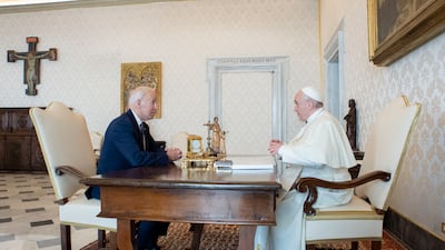 Pope Francis meets with with Joe Biden at The Vatican. AFP