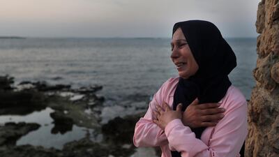 Lebanese Afaf Adulhamid, the mother of Mohammed Khaldoun, 27, who is still missing at sea after trying with other migrants to reach Cyprus on a boat. AP