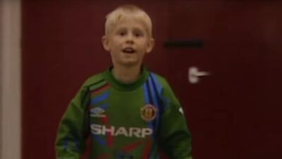 In this screenshot from YouTube, a young Kasper Schmeichel enjoys a kickabout with Thomas Ince and Alex Bruce.