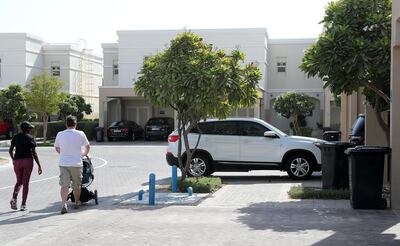 Jon Edwards (white t-shirt) at Al Ghadeer residential area in Abu Dhabi. Pawan Singh / The National