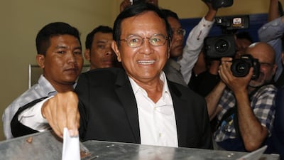 Kem Sokha, leader of the Cambodia National Rescue Party (CNRP), casting his ballot at a polling station in Phnom Penh during the June 2017 local elections where the opposition made significant gains. AFP