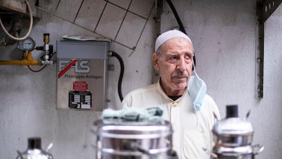 Hussain Al Khawaldi runs a coffee shop in Deira's Al Sabkha. He has been in the same Dubai neighbourhood for 40 years. All photos by Reem Mohammed / The National