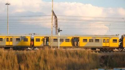 The trains through Soweto have people hanging in the doorways and between the carriages. Scott MacMillan for The National