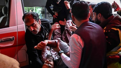 An injured man is moved to hospital after the explosion in Islamabad. AFP
