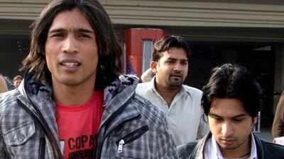 Pakistani left-arm paceman Mohammad Amir, left, is getting support from his mentor, Asif Bajwa, who is asking the ICC to review the 19 year old's five-year ban for spot-fixing.