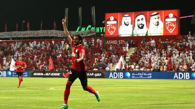 Humaid Abdulla Abbas of Al Ahli celebrates scoring the opening goal against Al Dhafra on Sunday. Warren Little / Getty Images