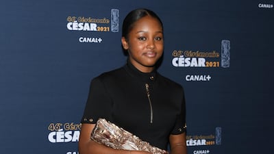 Actress Fathia Youssouf poses during a photocall after receiving the Best Female Newcomer Award for her role in the film 'Mignonnes' (Cuties) during the 46th Cesar Awards ceremony at the Olympia concert hall in Paris, France. Reuters