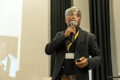 Speaker Ajmal Hasan, education manager at the Mleiha Archaeological Centre, at the symposium in Ajman. Antonie Robertson/The Nationa