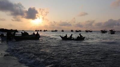 Somali fishermen sail on the Indian Ocean near Liido beach, in Mogadishu, Somalia, on November 4, 2016. Feisal Omar / Reuters