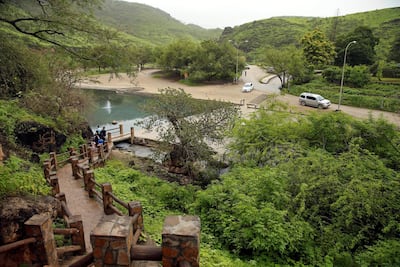 Tourists visit a cave at Ain Razat, a water spring in Salalah, Dhofar province, Oman, August 2016. Reuters