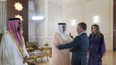 Lt General Sheikh Saif bin Zayed, UAE Deputy Prime Minister and Minister of Interior (2nd L), receives King Abdullah II, King of Jordan (R), during a reception at the Presidential Airport. They are seen with Sheikh Tahnoon bin Zayed, UAE National Security Advisor (L) and Queen Rania Al Abdullah, Queen of Jordan (back R). Mohamed Al Hammadi / Crown Prince Court - Abu Dhabi