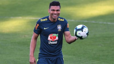 Casemiro sees the funny side of training. AFP