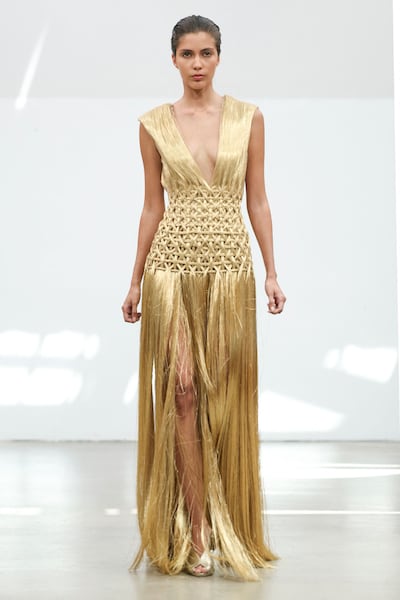 The designer mined his own Syrian culture for inspiration, including this look where he references Aghabani embroidery. AFP