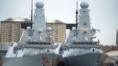 Two of the Royal Navy's Type 45 destroyers, 'HMS Dragon', left, and 'HMS Duncan', in Portsmouth Harbour, on February 7, 2022. PA