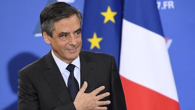 Francois Fillon is socially conservative and open about his traditional Catholic values. Eric Feferberg / AFP