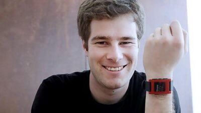 Eric Migicovsky, the chief executive of Pebble, displays his company's smart watch. Marcio Jose Sanchez / AP Photo