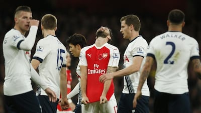 Tottenham, in white, finished behind Arsenal, in red, for a 21st successive season. Andrew Couldridge / Action Images