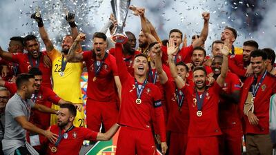 Cristiano Ronaldo lifts the Nations League trophy after Portugal beat the Netherlands in the final. Reuters