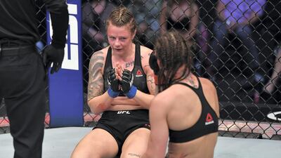 Joanne Calderwood, left, of Scotland after her win over American fighter Jessica following their flyweight bout at UFC 257 . Jeff Bottari/Zuffa LLC