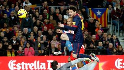 Barcelona's Lionel Messi scores his second against Atletico Madrid.
