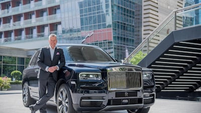 Torsten Muller-Otvos, chief executive of Rolls-Royce Motor Cars, with the Cullivan SUV. Photo courtesy Rolls-Royce Motor Cars