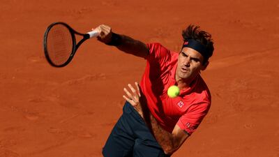 Roger Federer serves against Denis Istomin. Getty