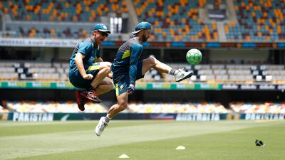 Australian assistant coach Andrew McDonald, left, and Matthew Wade. Getty