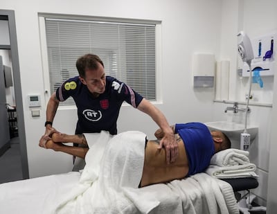 England osteopath Carl Todd treating defender Kyle Walker.