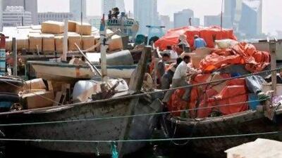 The UAE's historic trade and commercial ties with Iran mean companies operating in the country have found themselves on the frontline of the sanctions. Karim Sahib / AFP