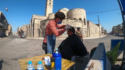 A barber in the old city of Mosul, Iraq April 18, 2020. Reuters