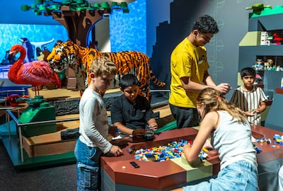 The exhibition combines large-scale Lego displays with hands-on building activities designed to spark curiosity and experimentation. Ruel Pableo for The National