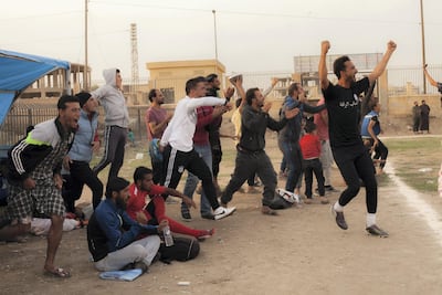 The fans are delighted after a third goal by the team they are supporting. Raqqa's Al Shabbab is leading 3-2. The final score. Charles Thiefaine for The National