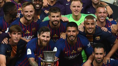 Barcelona celebrate their win in the Spanish Super Cup. AFP