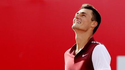 Bernard Tomic celebrates after defeating Adrian Mannarino in the ATP Bogota final on Sunday in Colombia. Leonardo Munoz / EPA / July 26, 2015