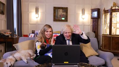 23/12/2021. Chequers, United Kingdom. Prime Minister Boris Johnson and his wife Carrie Johnson, with their daughter Romy, hold video calls from Chequers with Doctor Laura Mount, Director of Central and West Warrington, who leads a vaccination team, followed by Tom Jones, from Rickmansworth who attends RVS Rickmansworth lunch club and cares for his wife with Dementia. Picture by Simon Dawson / No 10 Downing Street