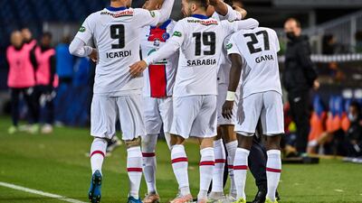 Paris Saint-Germain's French forward Kylian Mbappe celebrates with teammates after scoring against Montpellier. AFP