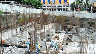 Property developers are increasingly looking to the remittances of the Filipino diaspora in the Arabian Gulf to fund the construction of thousands of new apartments. AFP