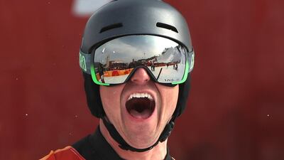 Nevin Galmarini of Switzerland celebrates his win in the men's snowboard parallel giant slalom finals at the PyeongChang 2018 Olympic Games, South Korea. Farzy Ismail / EPA