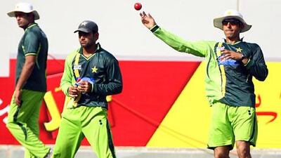 Pakistan captain Misbah-ul-Haq, right, believes Mohammad Hafeez, centre, is 'improving day by day' and is crucial to Pakistan's success.