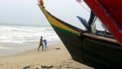A man carry a small fishing nets at the MaungMaKan village in Dawei city, Tanintharyi division, Myanmar. Nyein Chan Naing / EPA