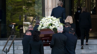 Albright’s coffin is carried into Washington National Cathedral. AP