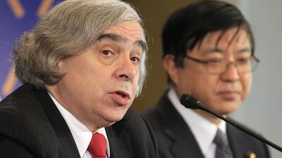 The US energy secretary Ernest Moniz, left, and Japan's special adviser to Prime Minister Yosuke Isozaki announce a deal for the handover of Japanese nuclear nuclear material to the US, at the Nuclear Security Summit in the Hague on March 24, 2014. Yves Logghe / AP Photo