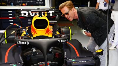 Actor Damien Lewis is given a tour of the Red Bull garage. Getty