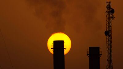 A power plant smokestack in Basra. Iraq, the second-largest oil producer within Opec, has room to grow output substantially. AFP
